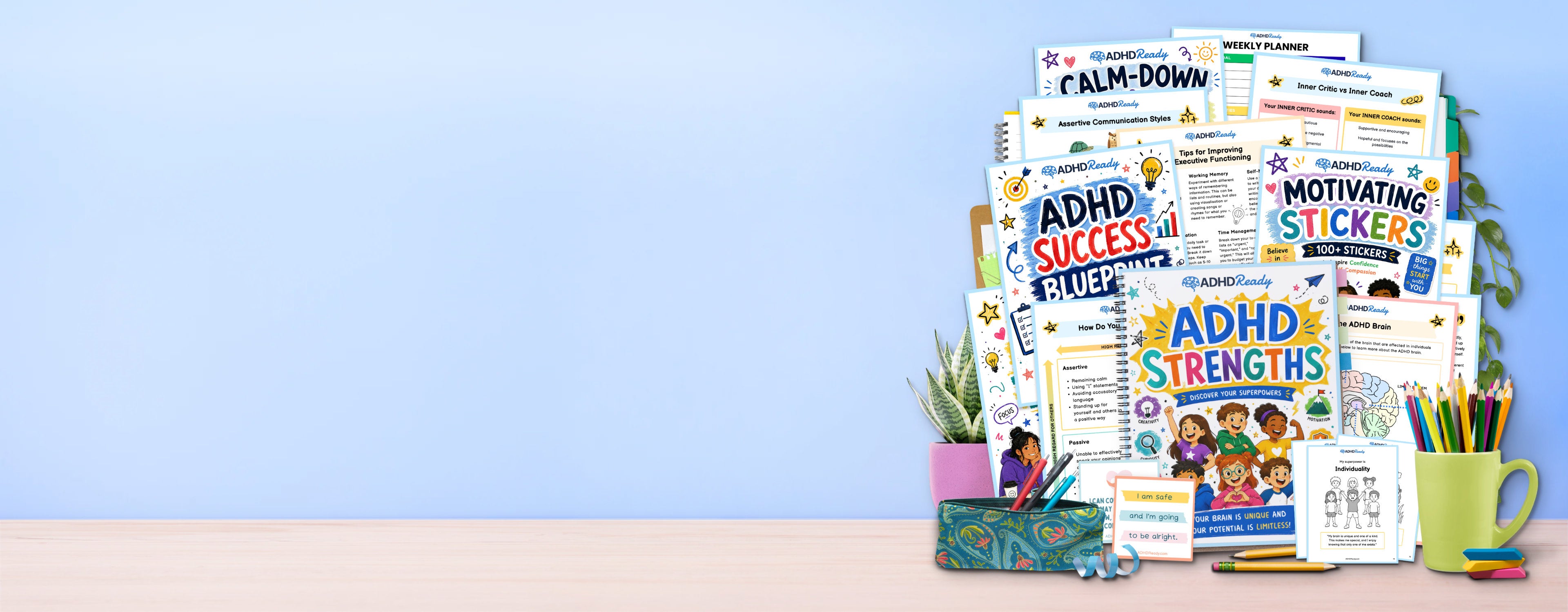 Collection of ADHD Ready printable workbooks, planners, and stationery items on a desk with a blue wall background.