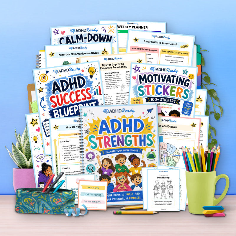 Collection of ADHD Ready printable workbooks, planners, and stationery items on a desk with a blue wall background.